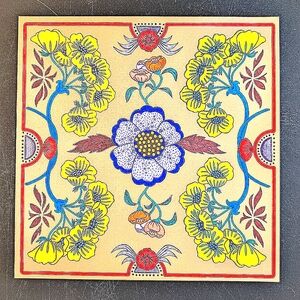 Floral Decorative Tile with Yellow and Blue Accents